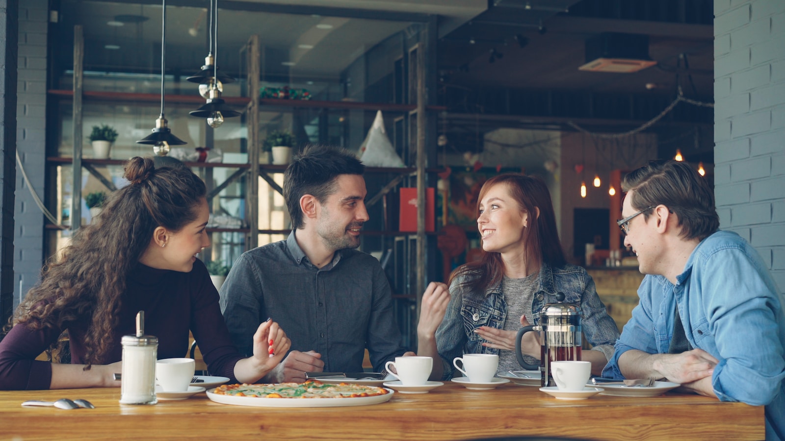 A group of friends having a café conversation